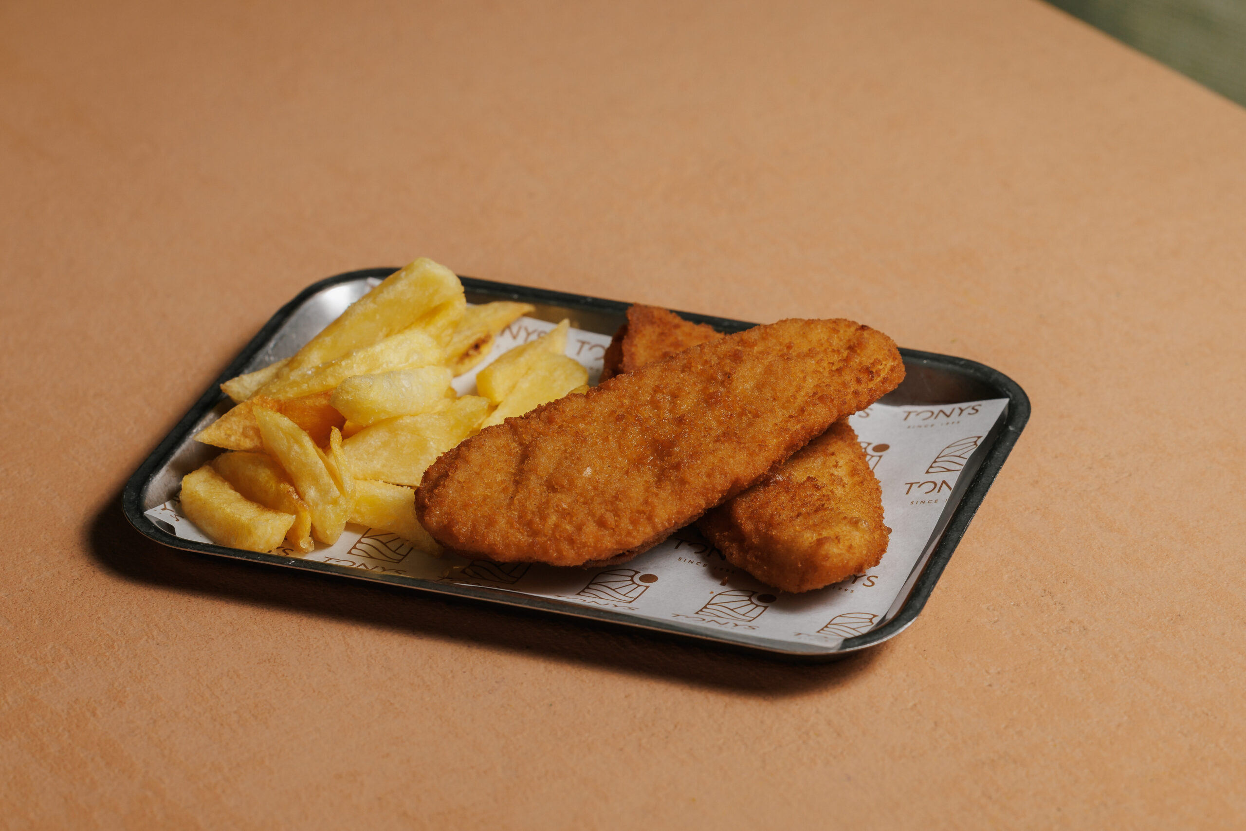 Merluza rebozada con patatas